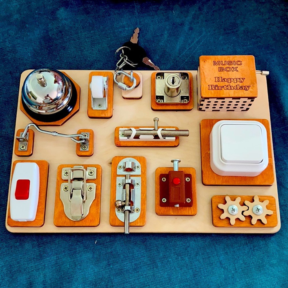 Handmade toddler busy board